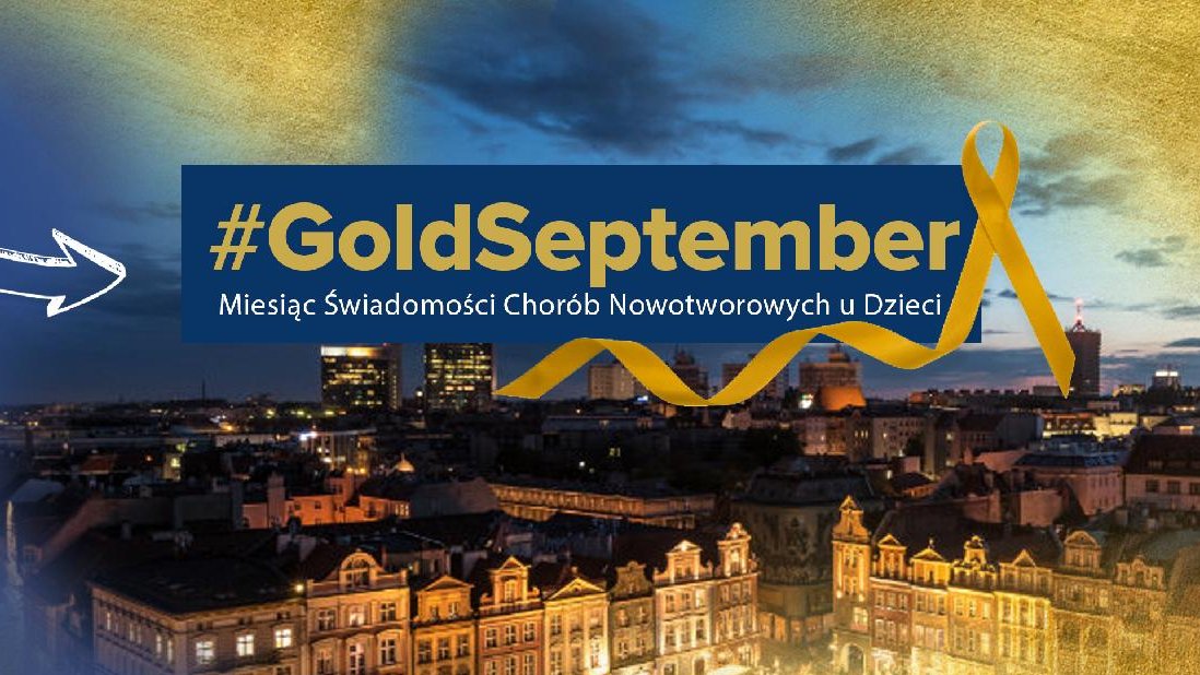 Na ilustracji widać miasto podświetlone na złoto. Nad zdjęciem znajduje się napis Gold September i złota wstążka.