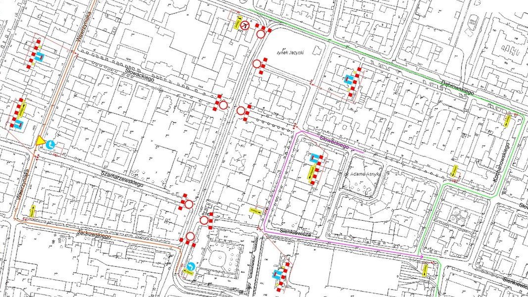Schemat na którym widać znaki zakazu, szlabany oraz kolorowe linie z sugerowanymi trasami objazdów