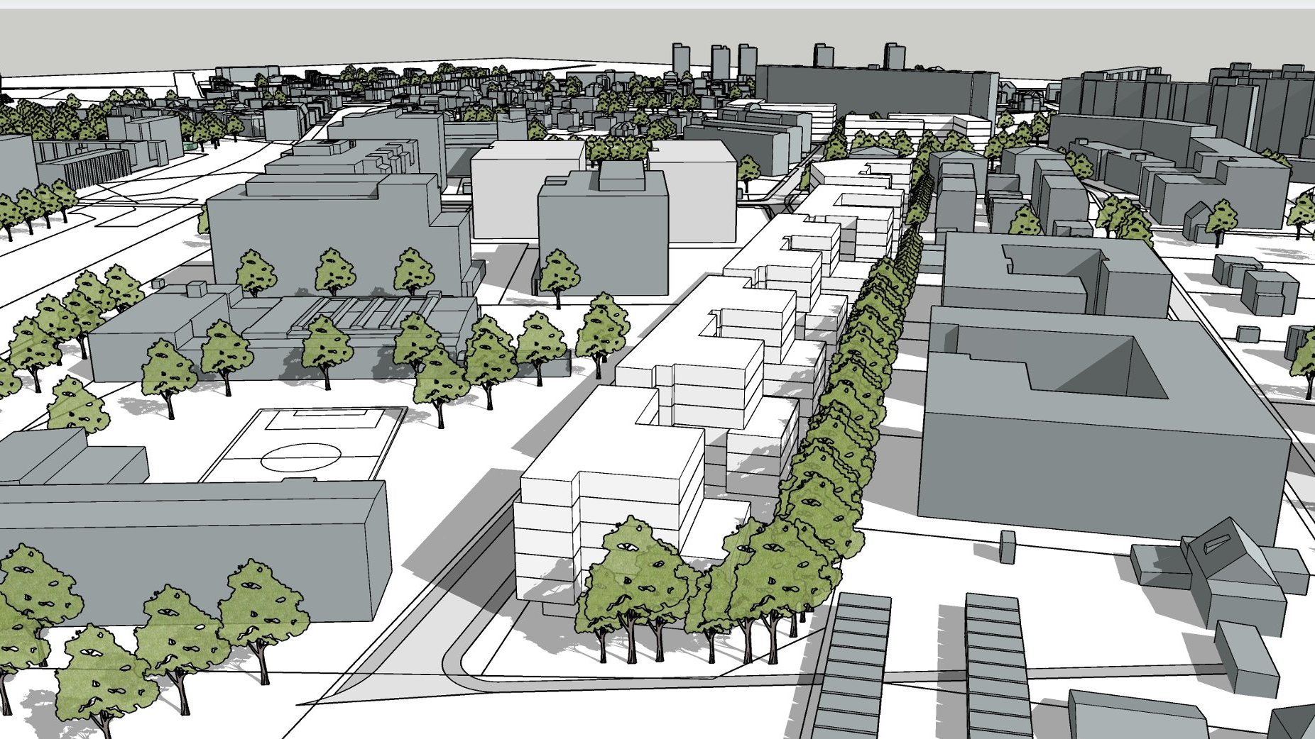 Szczegółowy plan architektoniczny lub urbanistyczny miasta. Widok z góry na różnorodne budynki, ulice i tereny zielone. Budynki mają różne kształty i rozmiary, niektóre z płaskimi dachami, inne bardziej skomplikowane. Drzewa są rozproszone po całym obszarze, wzdłuż ulic i na terenach zielonych. W dolnym lewym rogu widoczna jest sportowa przestrzeń.